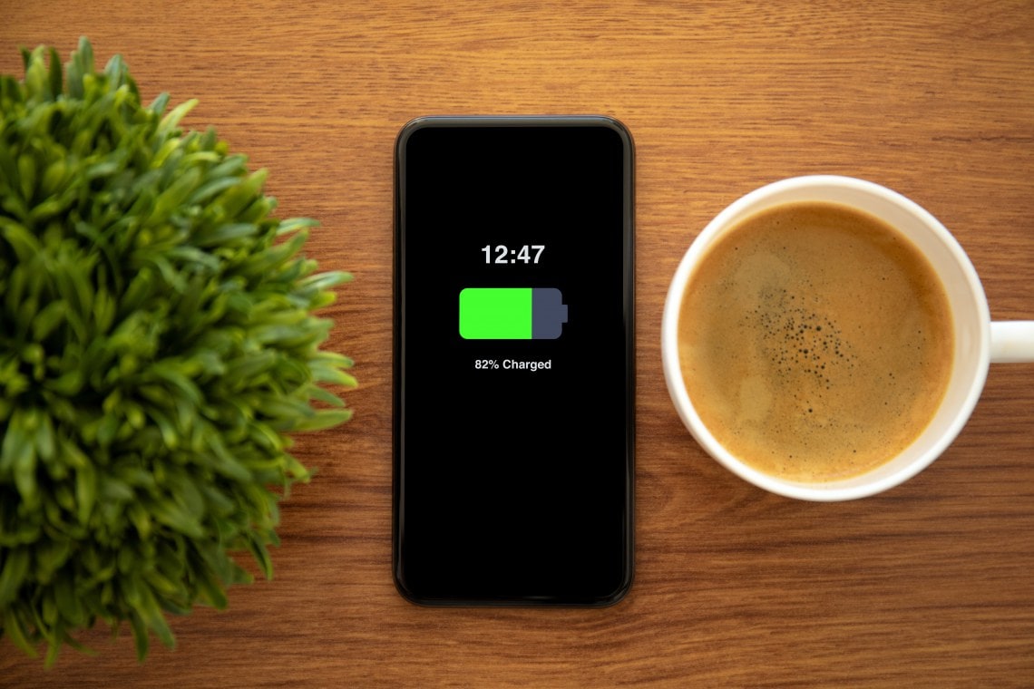 smartphone and coffee cup