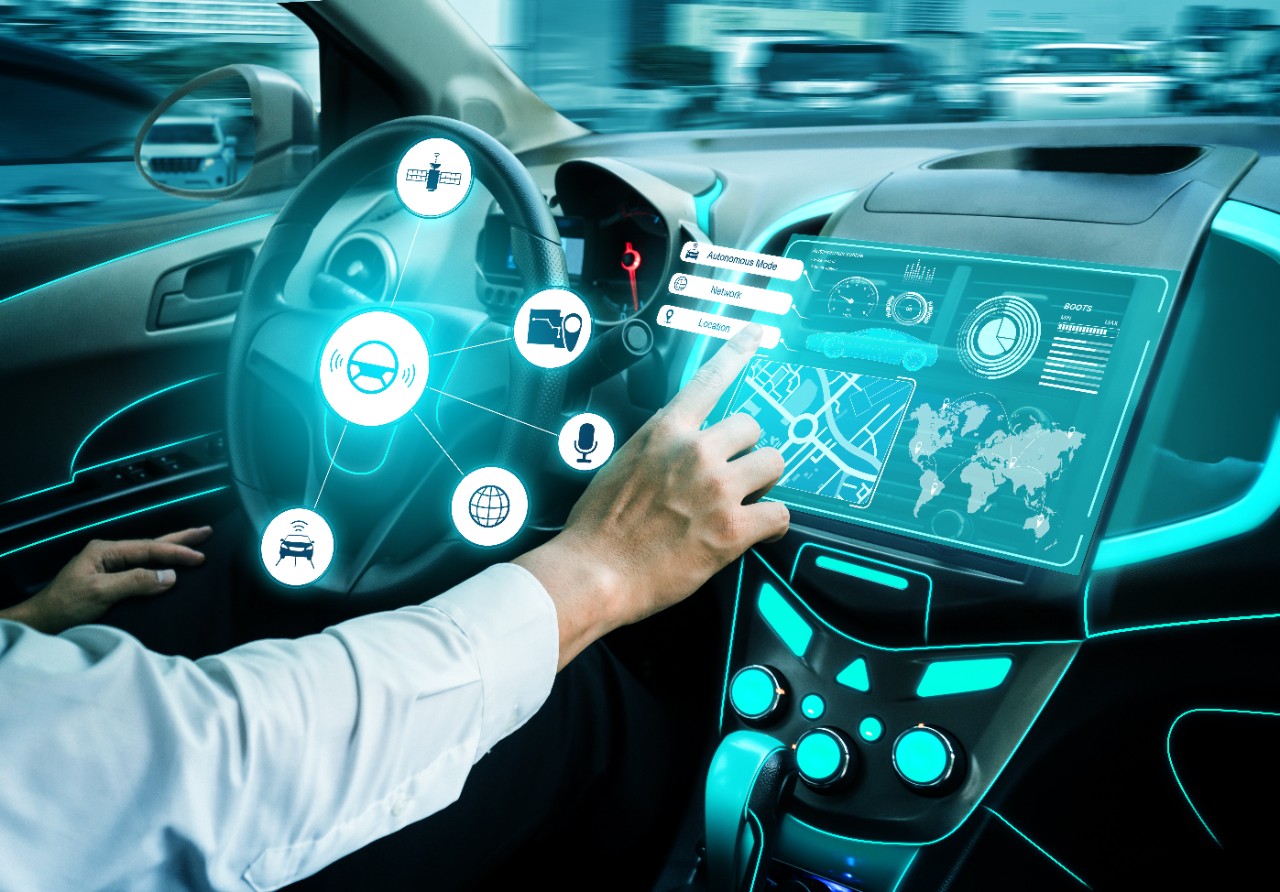 Driverless car interior with futuristic dashboard for autonomous control system . Inside view of cockpit HUD technology using AI artificial intelligence sensor to drive car without people driver .